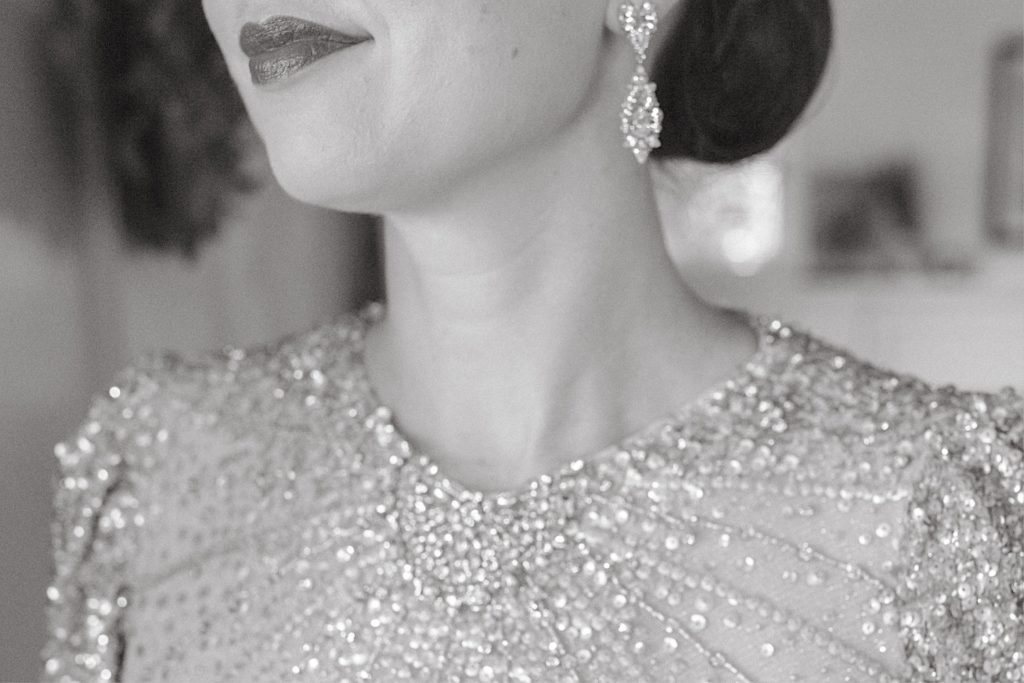portrait of bride in glamours dress and earrings