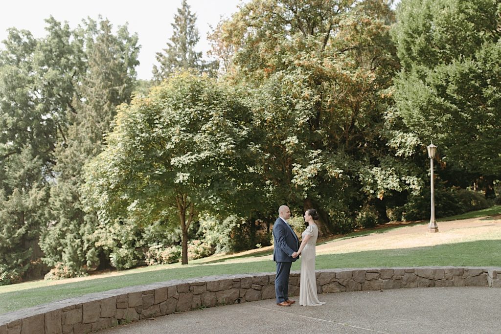 portraits of bride and groom at cathedral park wedding