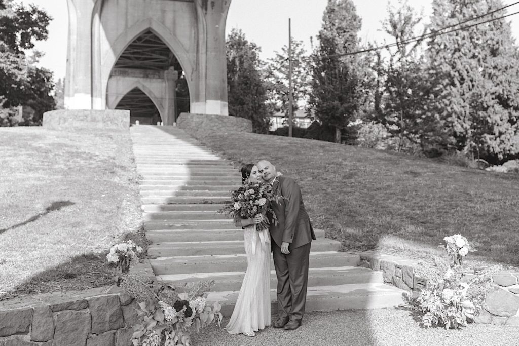 private moment between bride and groom at cathedral park wedding
