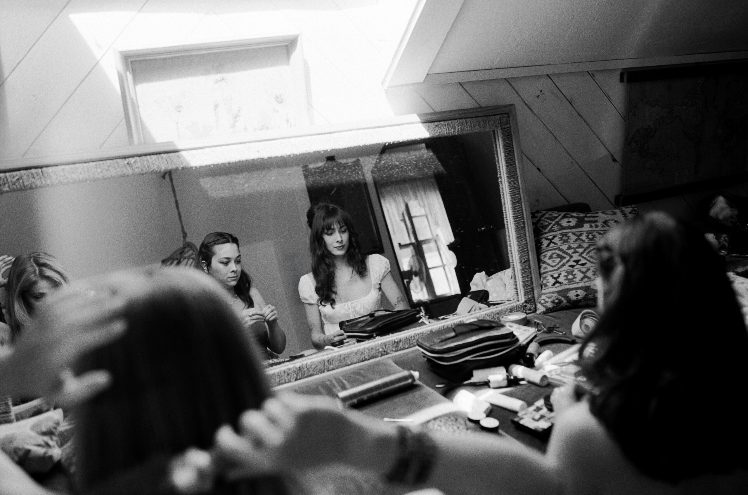 bride getting ready at mt Shasta airbnb on black and white film